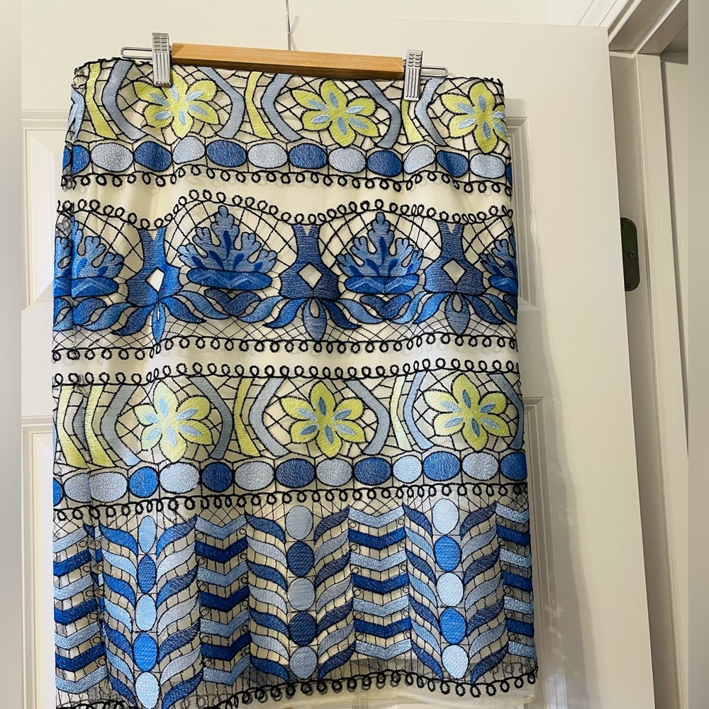 ECI pencil skirt. Cream lining with beautiful colored overlay.
